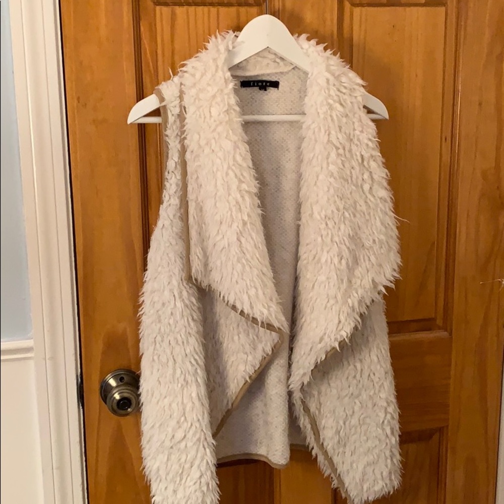 White fluffy vest